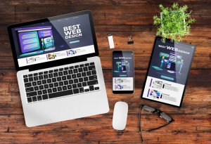 Electronic Devices on Table - Above The Bar - Above The Bar Computer Phone Tablet on Table All Saying Best Web Design on Them - Electronic Devices on Table - Above The Bar - Electronic Devices on Table - Above The Bar
